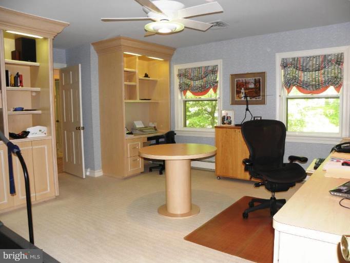 7004 Nevis Road Bethesda, MD 20817 - Photo 17 of 24 a view of a livingroom with workspace and a window