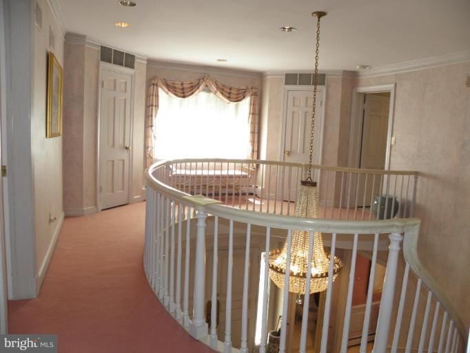 7004 Nevis Road Bethesda, MD 20817 - Photo 22 of 24 a view of entryway with wooden floor