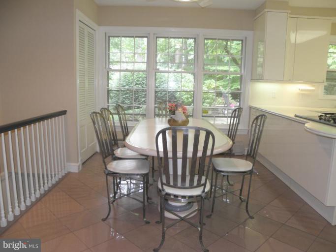 7004 Nevis Road Bethesda, MD 20817 - Photo 24 of 24 a view of a dining room with furniture window and outside view