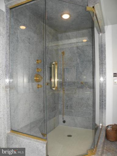7004 Nevis Road Bethesda, MD 20817 - Photo 10 of 24 a bathroom with a shower