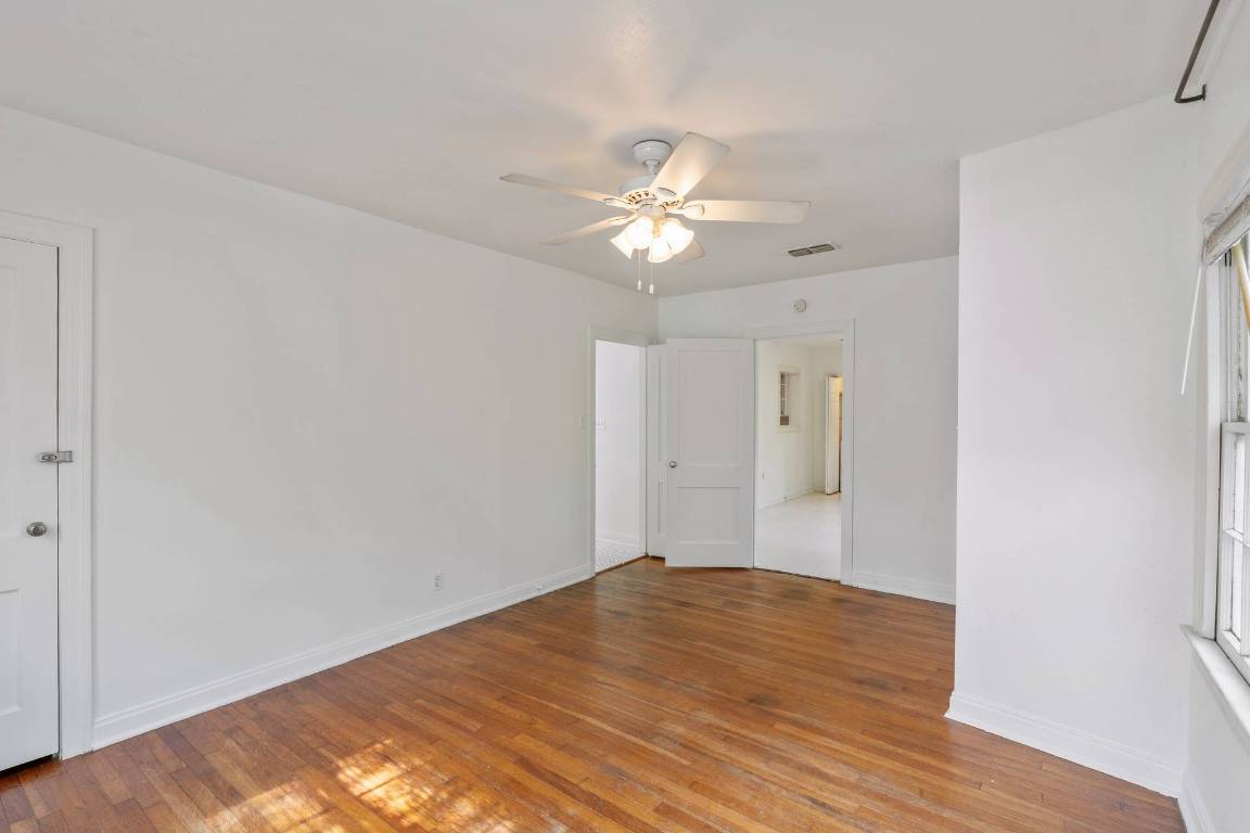 406 East Monroe Street, Unit B Austin, TX 78704 - Photo 25 of 35 a view of empty room with wooden floor