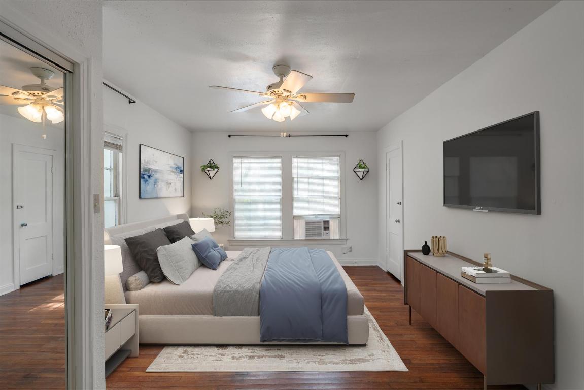 406 East Monroe Street, Unit B Austin, TX 78704 - Photo 7 of 35 a living room with furniture and a flat screen tv