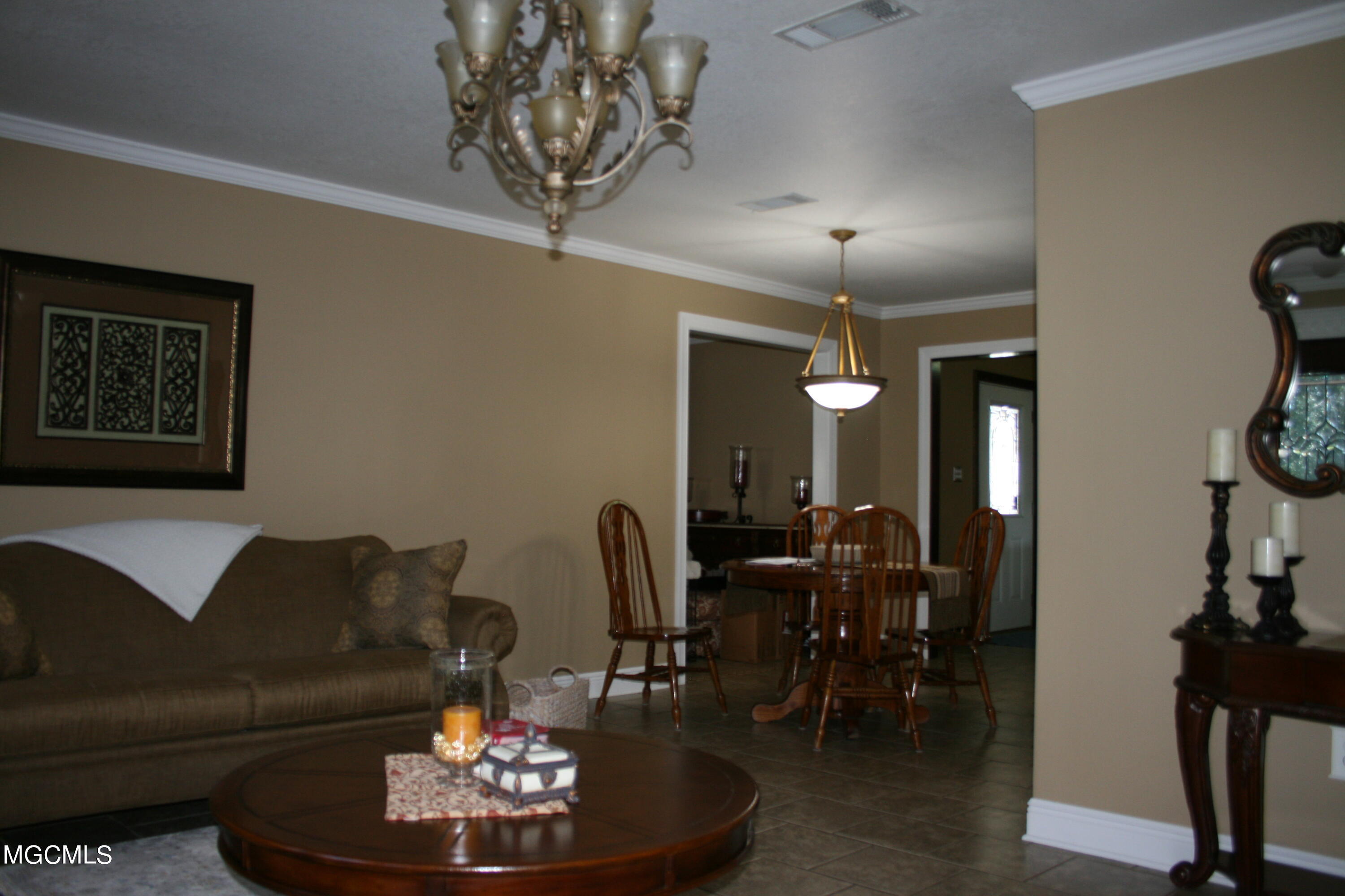 15488 Three Rivers Road Biloxi, MS 39532 - Photo 11 of 18 From den into breakfast area