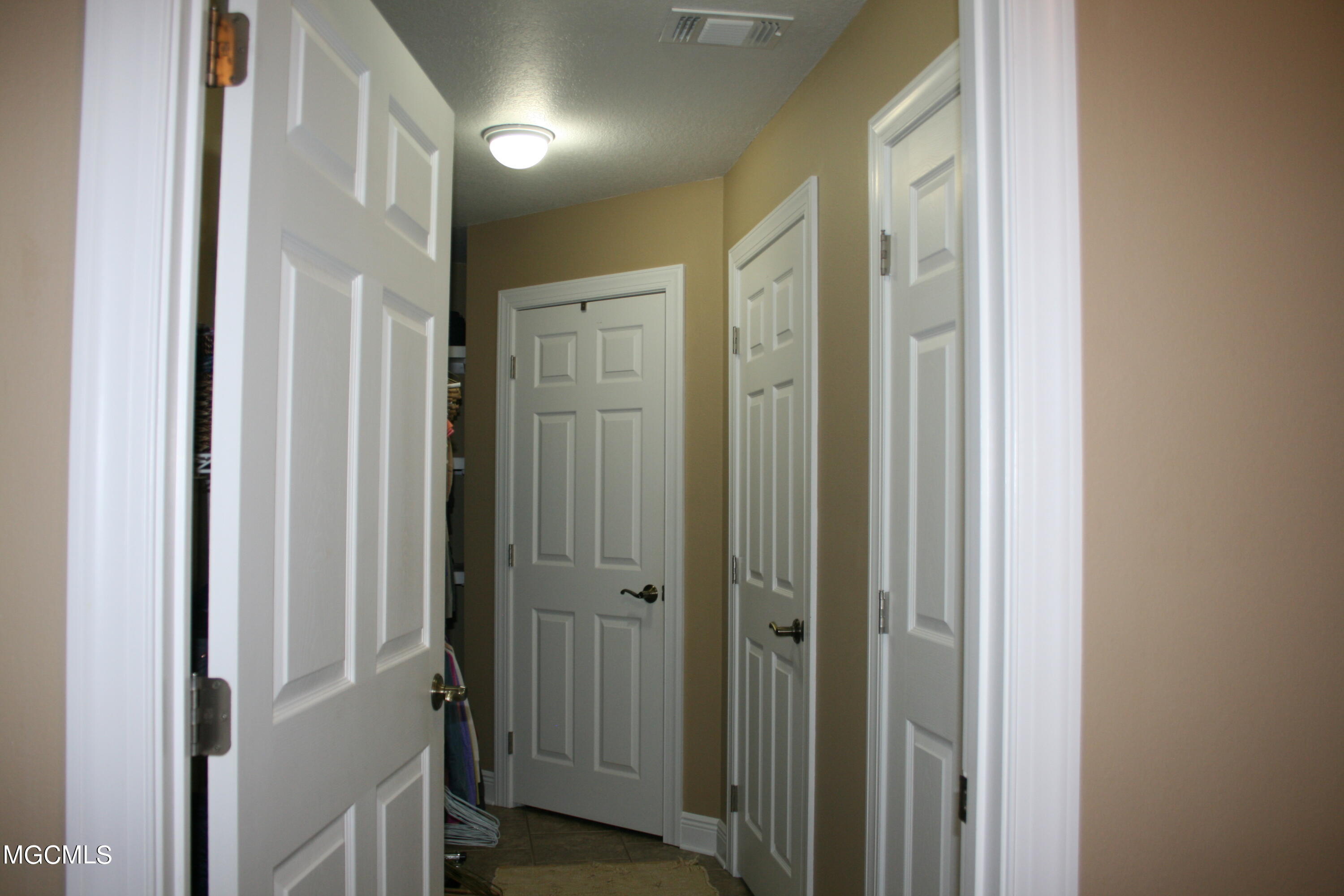 15488 Three Rivers Road Biloxi, MS 39532 - Photo 14 of 18 Separate storage area with 3 closets