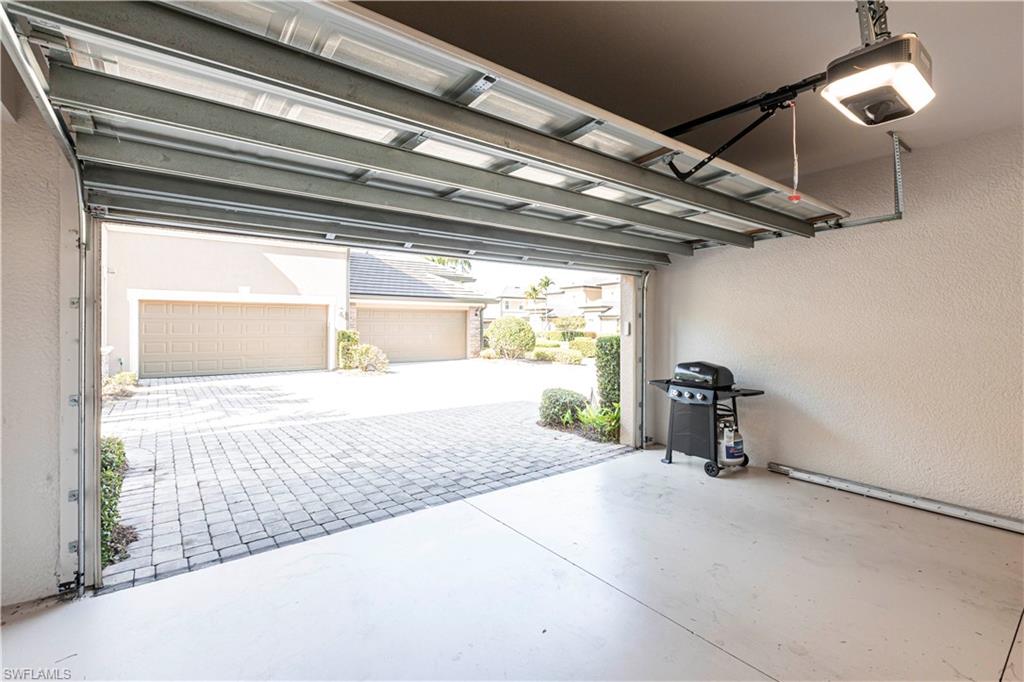 9508 Ironstone Terrace, Unit 2102 Naples, FL 34120 - Photo 36 of 50 a view of a room with wooden floor