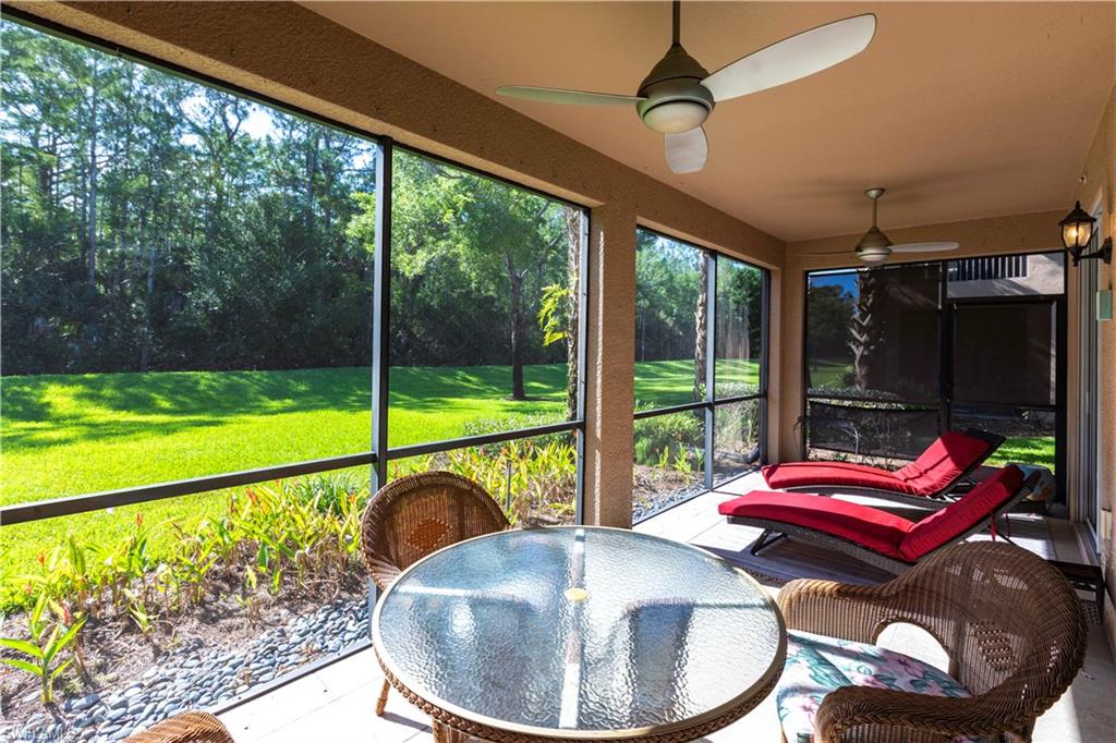 9508 Ironstone Terrace, Unit 2102 Naples, FL 34120 - Photo 40 of 50 a room with pool table and chairs