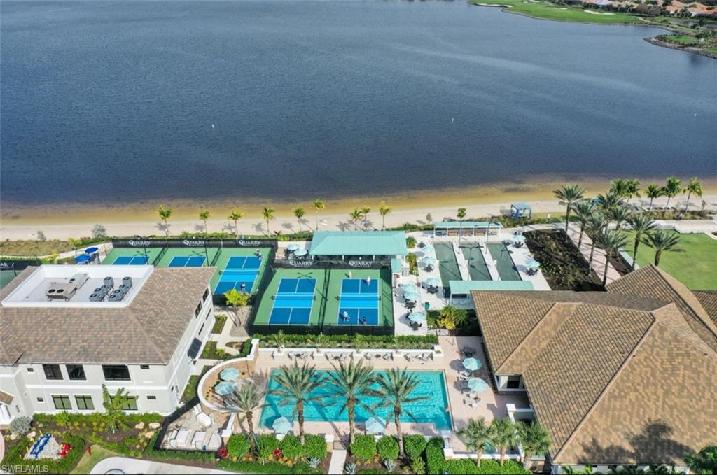 9508 Ironstone Terrace, Unit 2102 Naples, FL 34120 - Photo 47 of 50 an aerial view of a house with a garden and mountain view