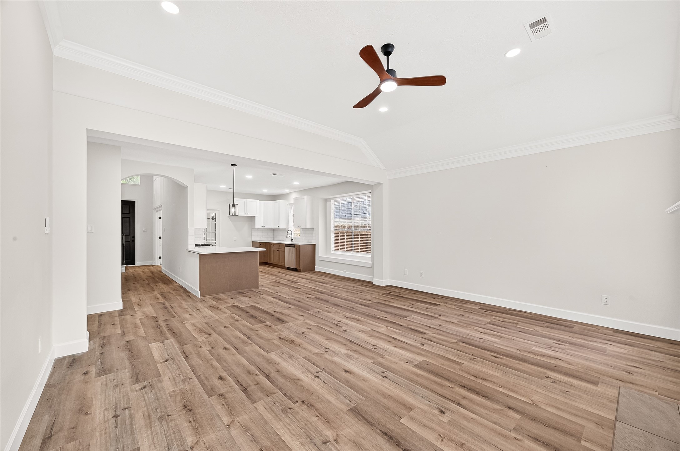 6714 Cleft Stone Drive Houston, TX 77084 - Photo 12 of 49 a view of a living room a sink and wooden floor