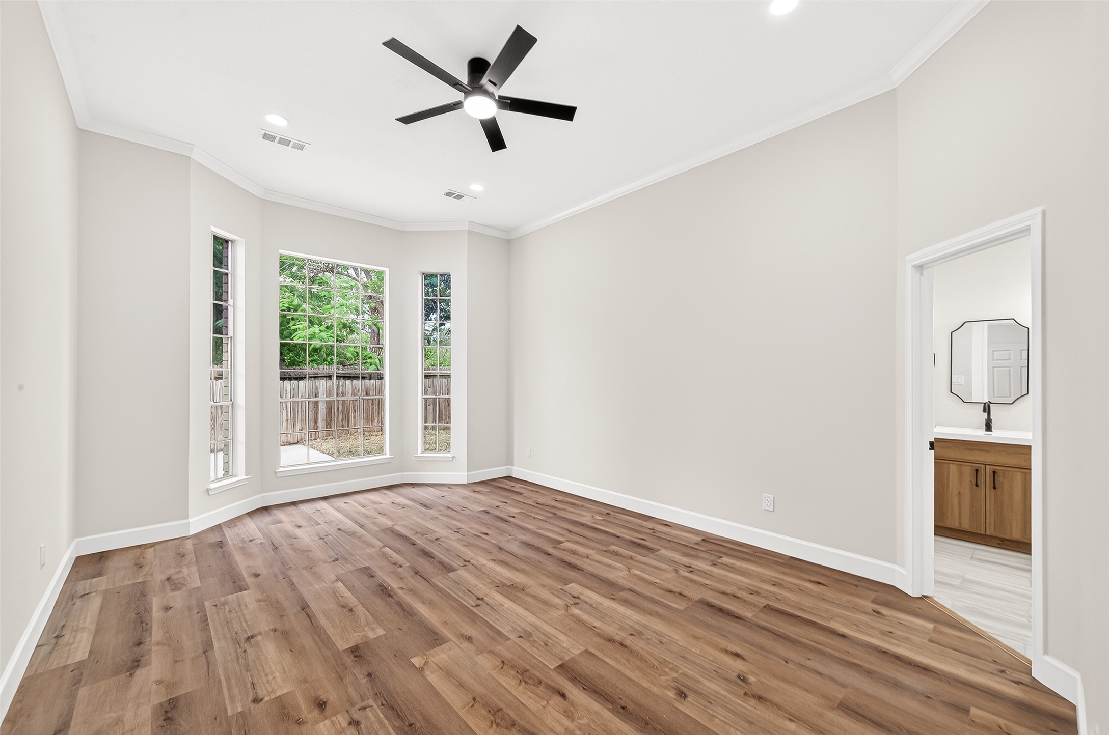 6714 Cleft Stone Drive Houston, TX 77084 - Photo 21 of 49 Primary Bedroom with 96" tall windows.