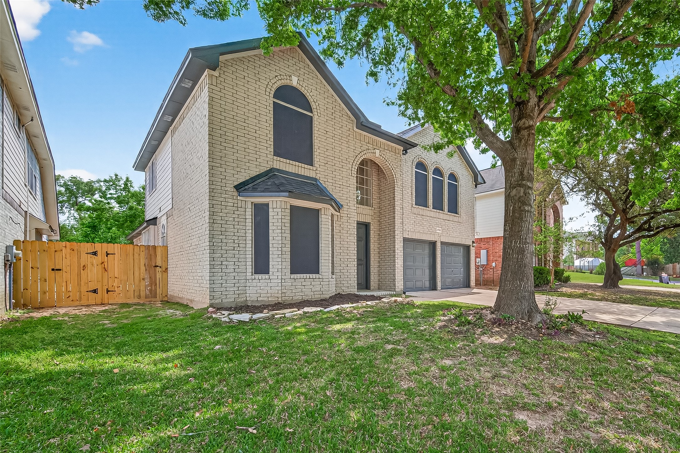 6714 Cleft Stone Drive Houston, TX 77084 - Photo 3 of 49 a front view of house with a garden
