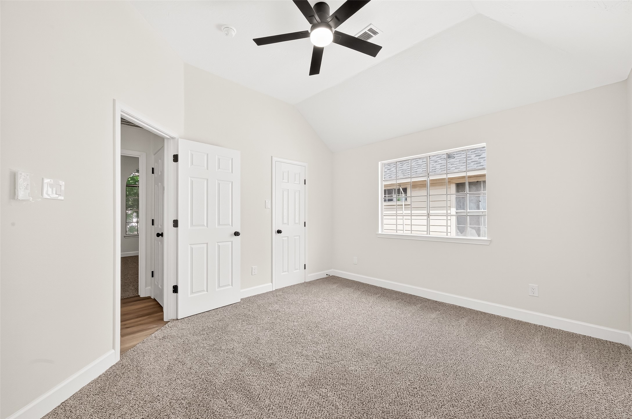 6714 Cleft Stone Drive Houston, TX 77084 - Photo 36 of 49 an empty room with closet and windows