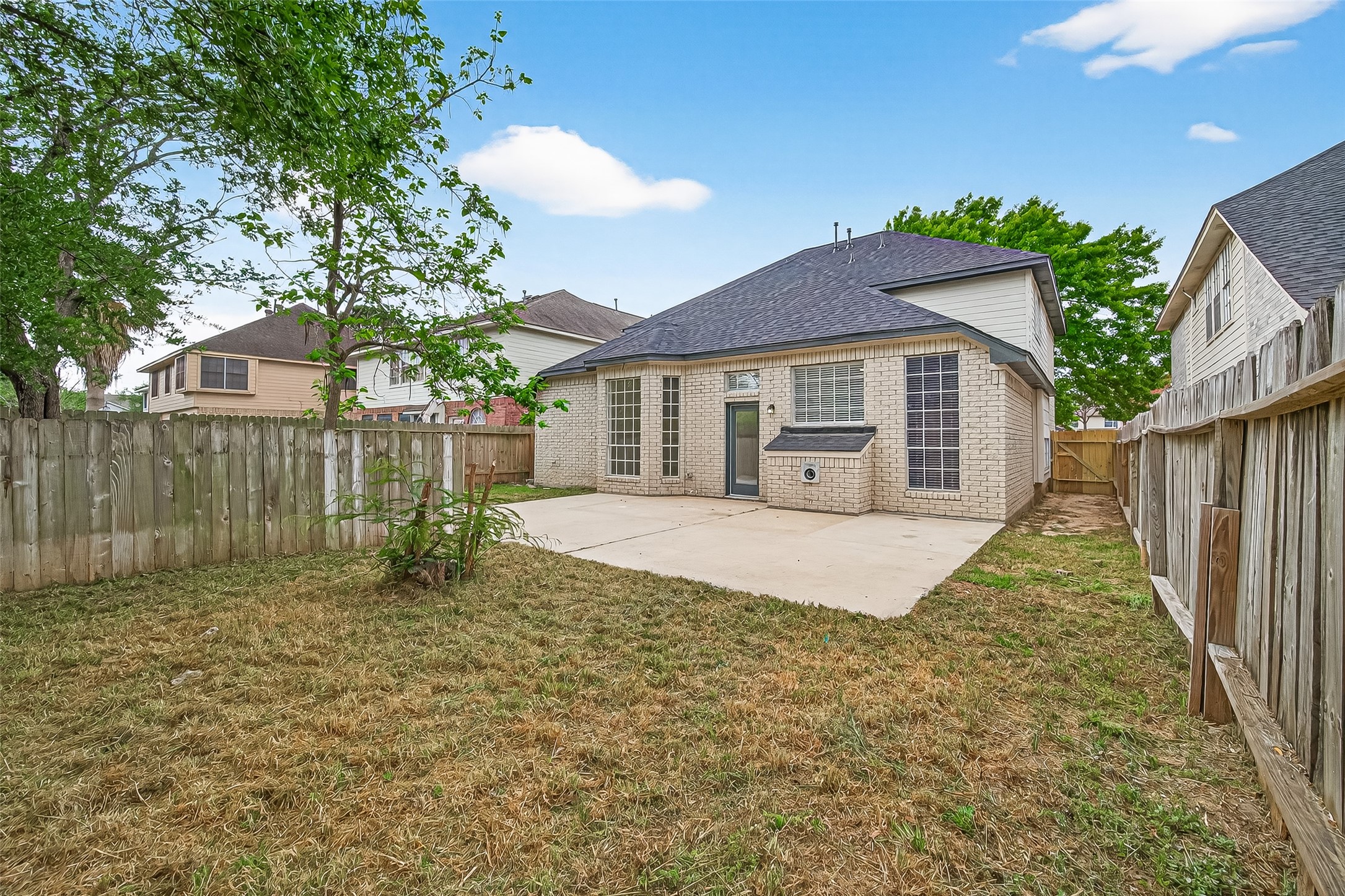 6714 Cleft Stone Drive Houston, TX 77084 - Photo 42 of 49 Slab patio with large back yard.