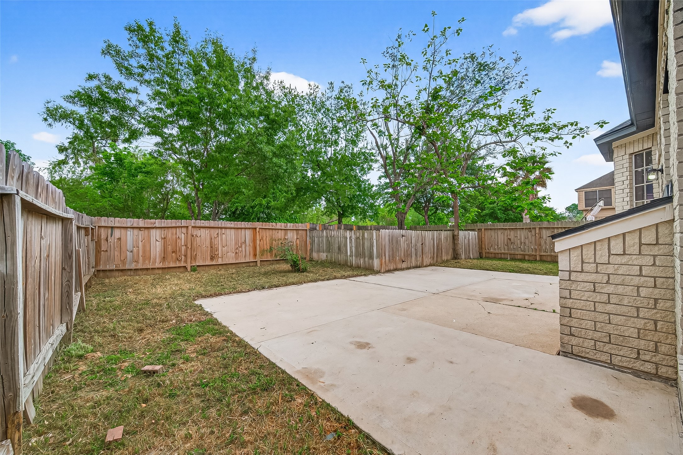 6714 Cleft Stone Drive Houston, TX 77084 - Photo 43 of 49 Slab patio with large back yard.