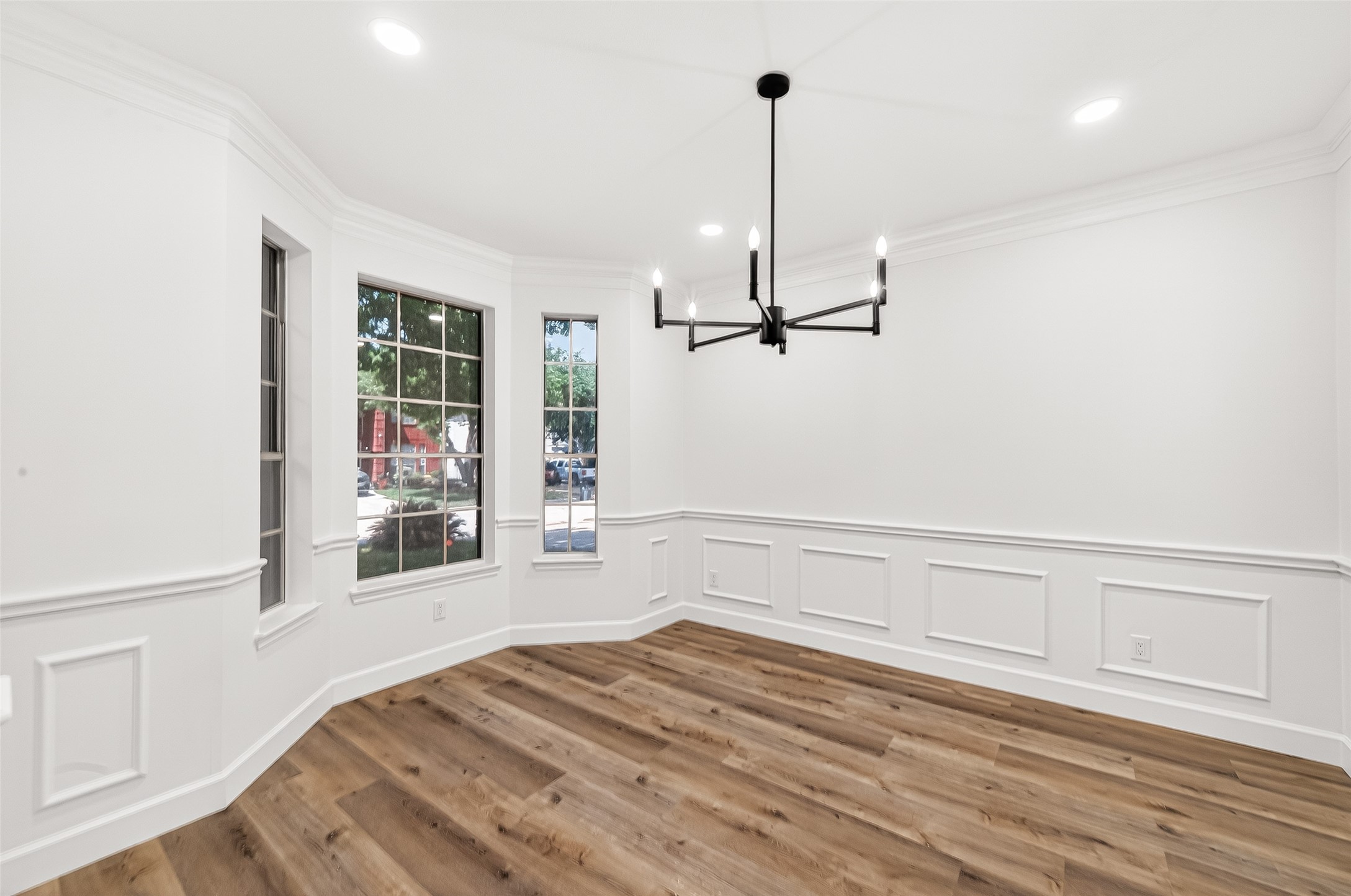 6714 Cleft Stone Drive Houston, TX 77084 - Photo 6 of 49 a view of empty room with wooden floor and window