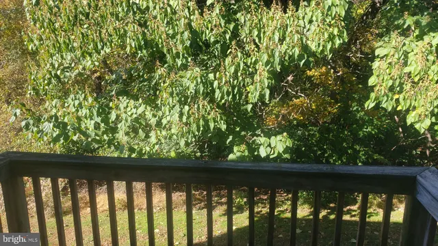 a view of a wooden floor and a lake view
