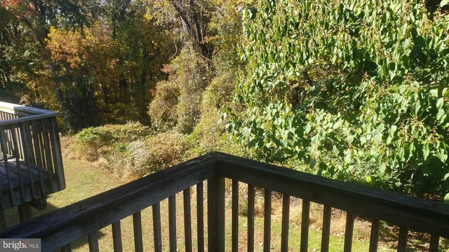 a view of balcony and trees