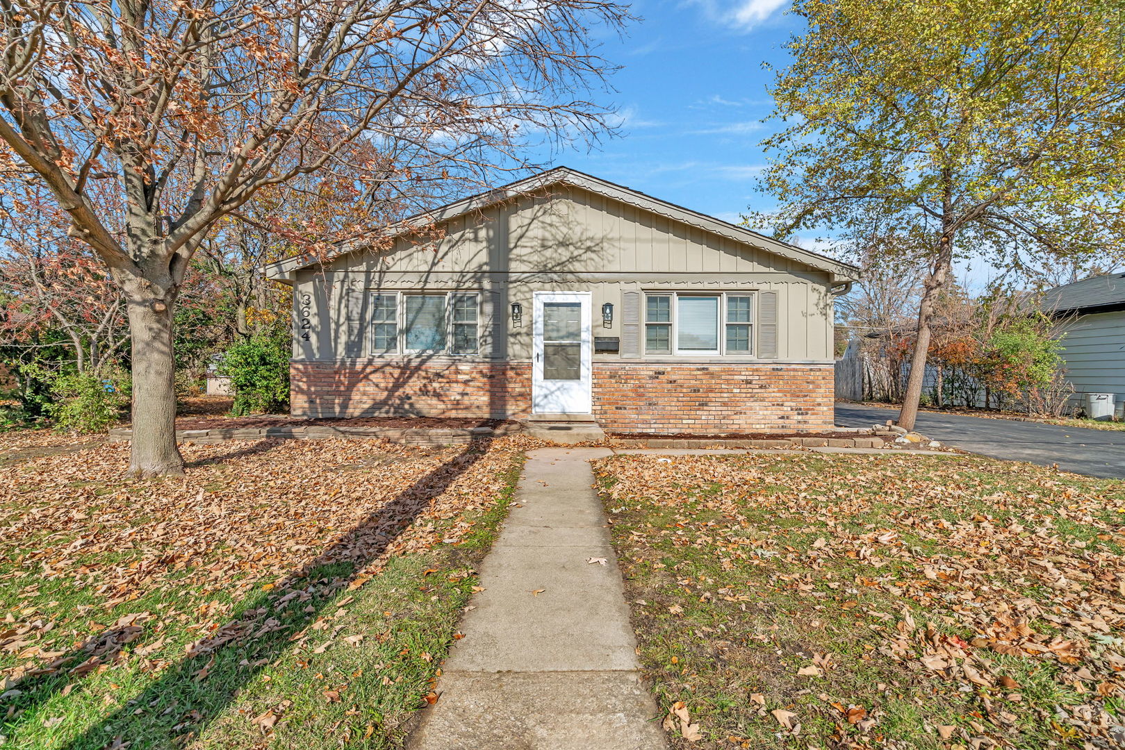 3624 151st Street Midlothian, IL 60445 - Photo 1 of 26 a view of a yard in front of house with trees