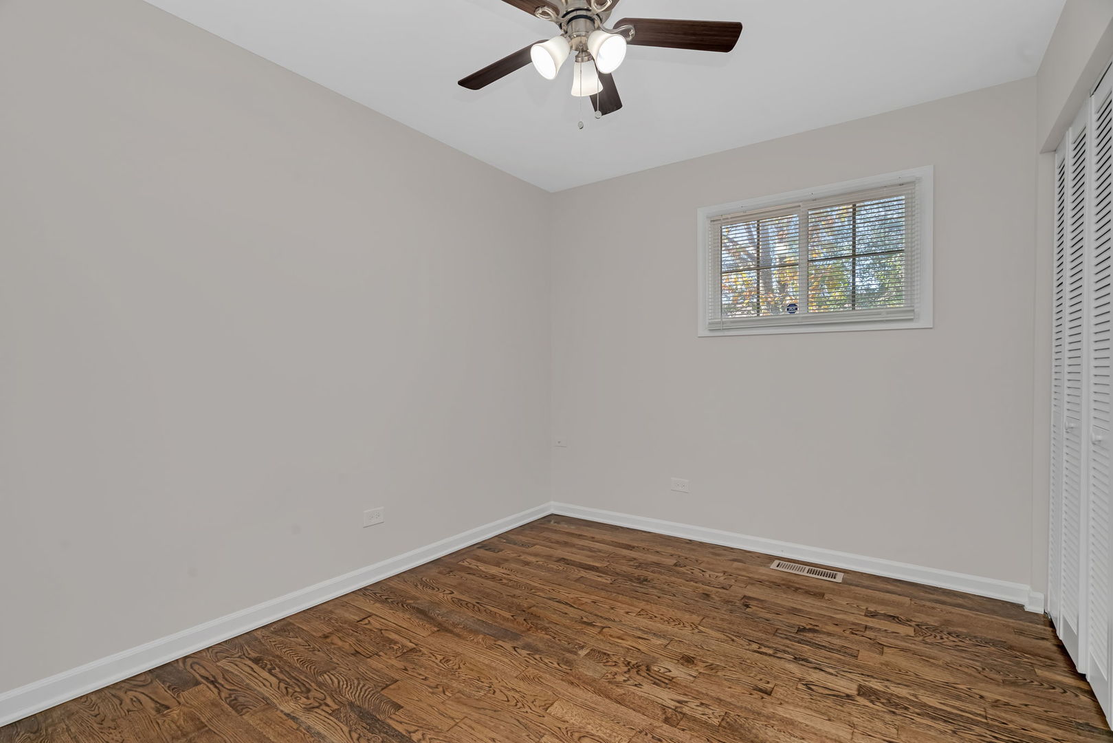 3624 151st Street Midlothian, IL 60445 - Photo 14 of 26 a view of an empty room with wooden floor