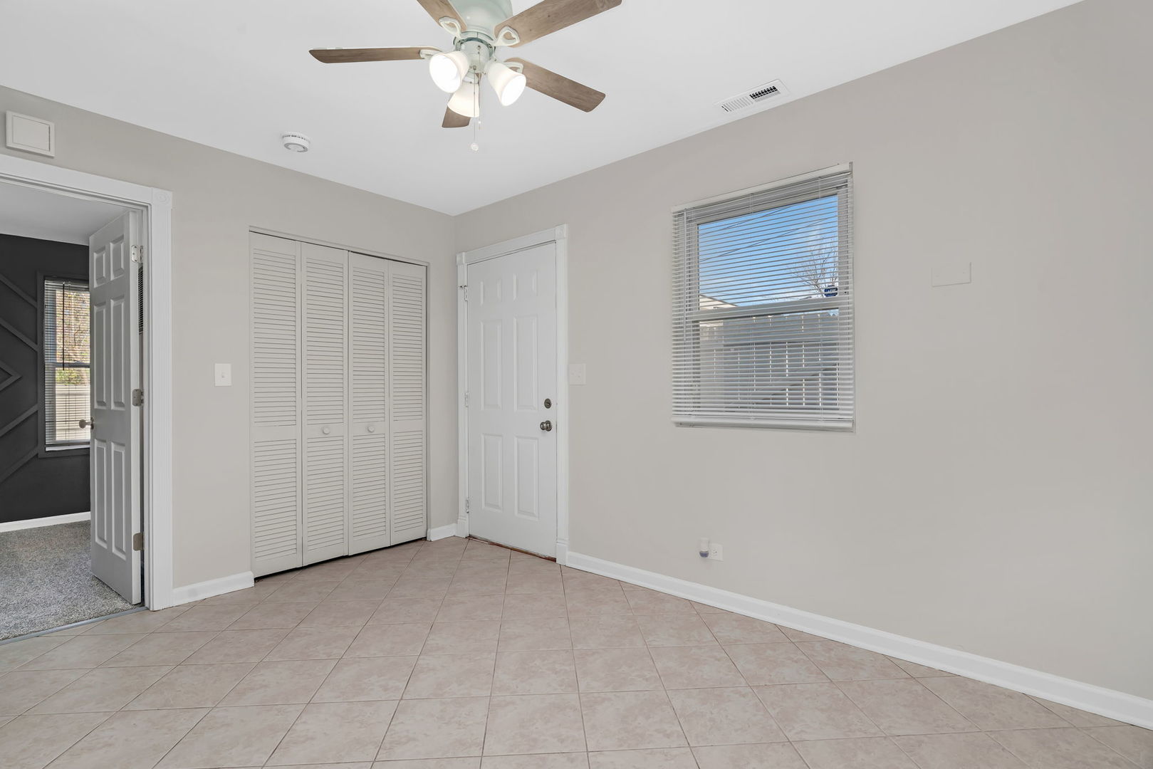 3624 151st Street Midlothian, IL 60445 - Photo 19 of 26 an empty room with windows and fan