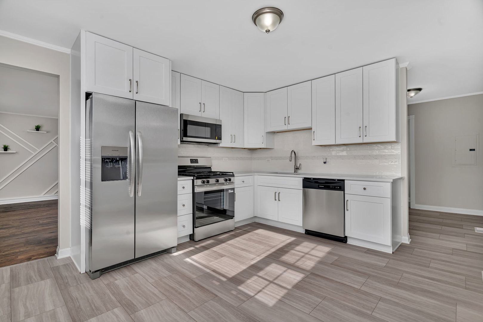 3624 151st Street Midlothian, IL 60445 - Photo 7 of 26 a kitchen with granite countertop a refrigerator stove and sink