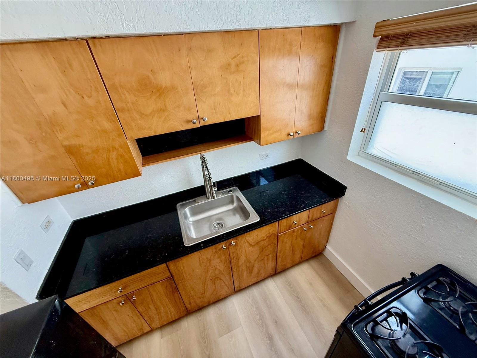 7334 Harding Avenue, Unit 3 Miami Beach, FL 33141 - Photo 16 of 23 a view of cupboard