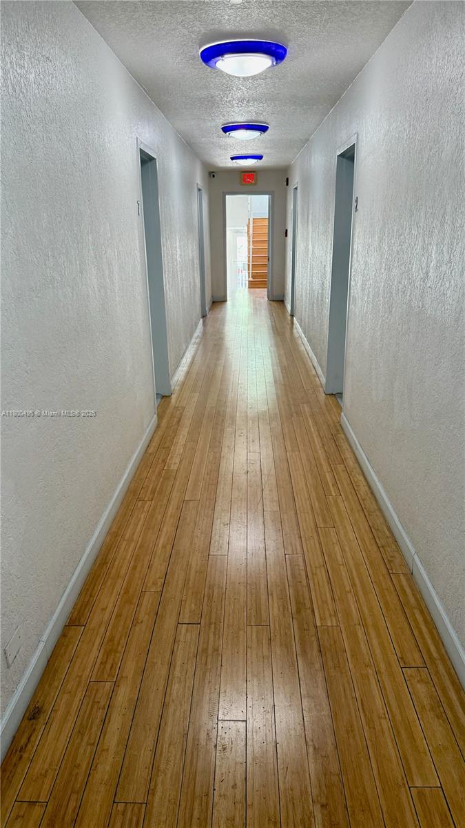 7334 Harding Avenue, Unit 3 Miami Beach, FL 33141 - Photo 23 of 23 a view of entryway with wooden floor