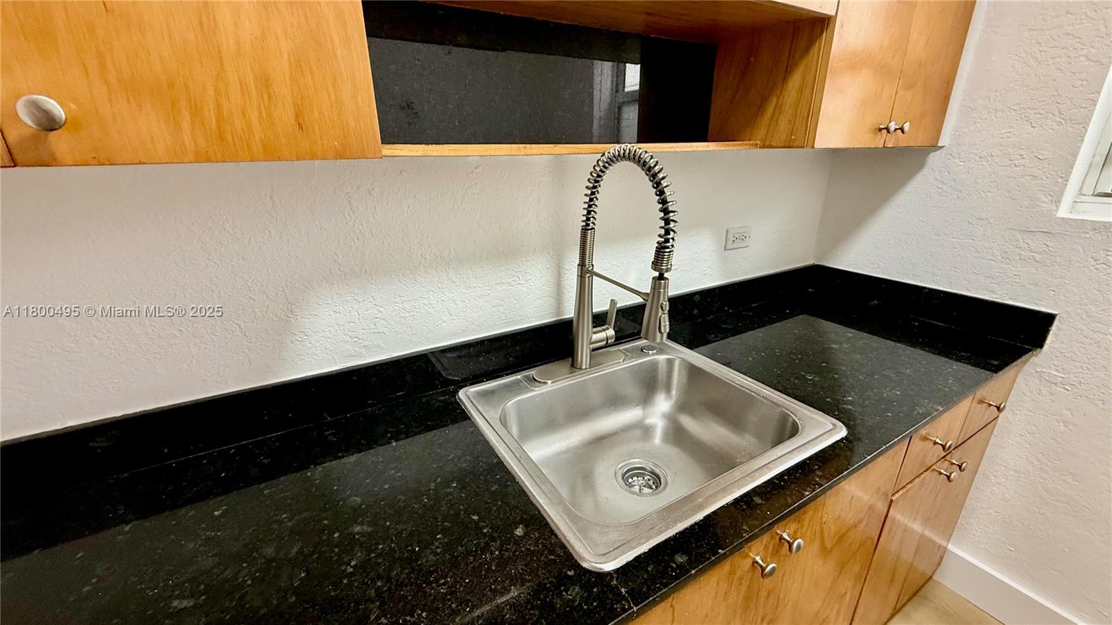7334 Harding Avenue, Unit 3 Miami Beach, FL 33141 - Photo 4 of 23 a bathroom with a sink and a mirror