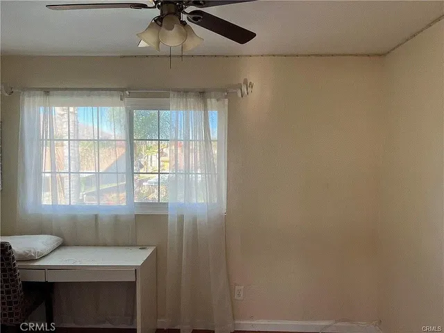 a room with a window and a table