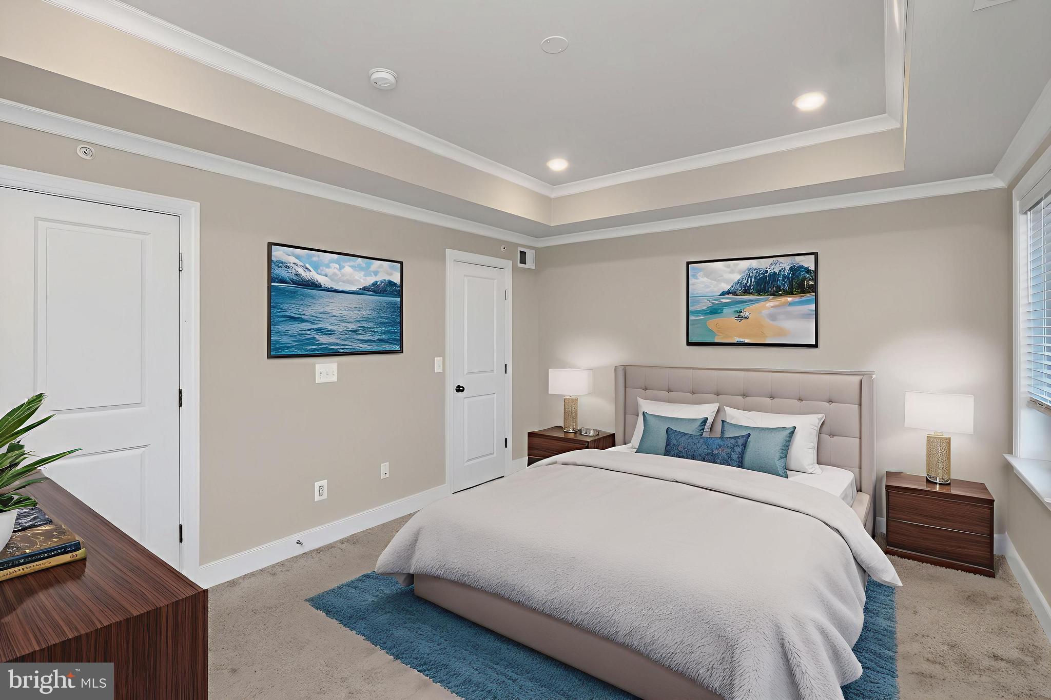 1322 Rail Woodbridge, VA 22191 - Photo 21 of 30 a bedroom with a large bed and a chandelier