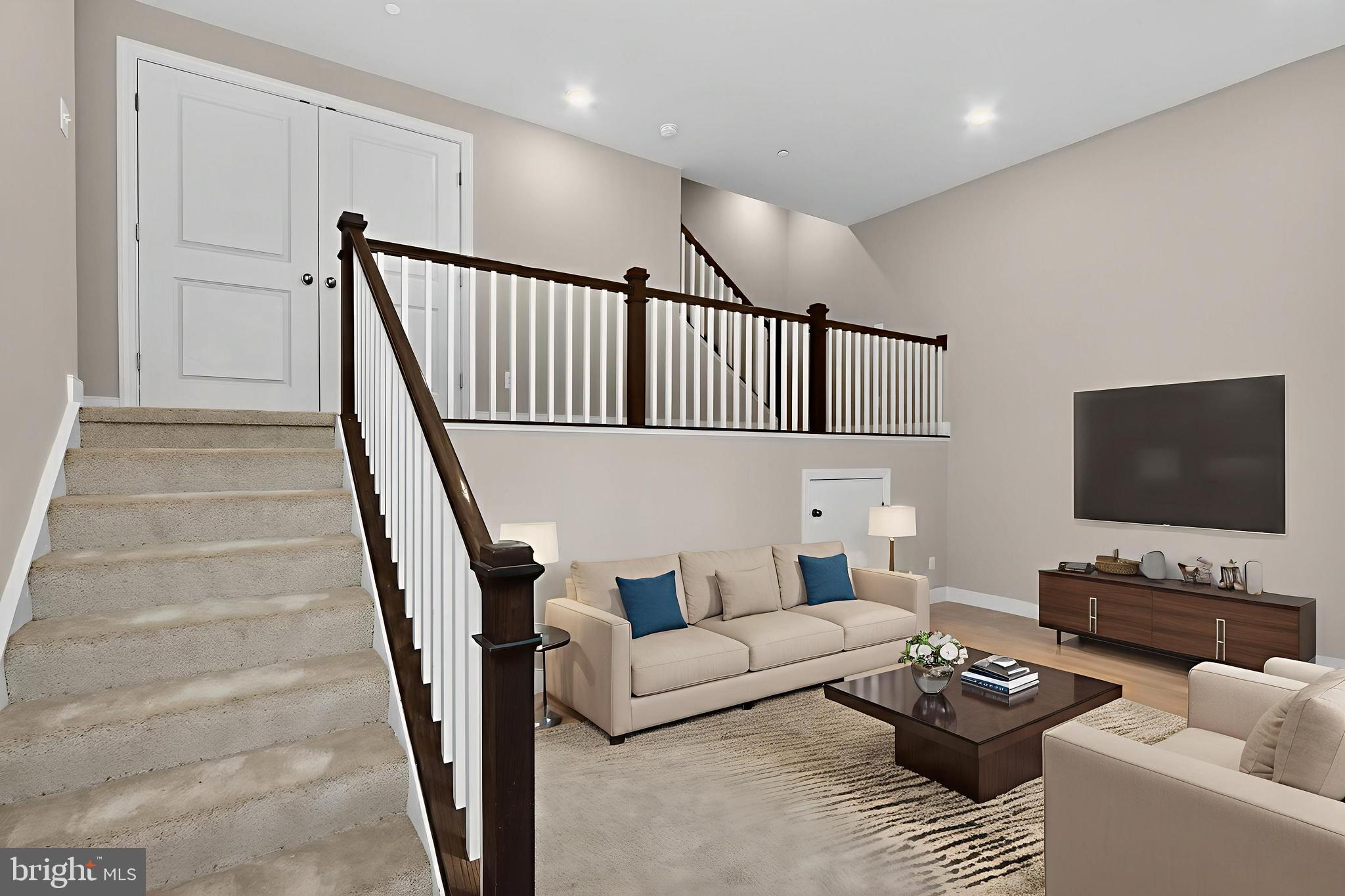 1322 Rail Woodbridge, VA 22191 - Photo 26 of 30 a living room with furniture and a flat screen tv with wooden floor