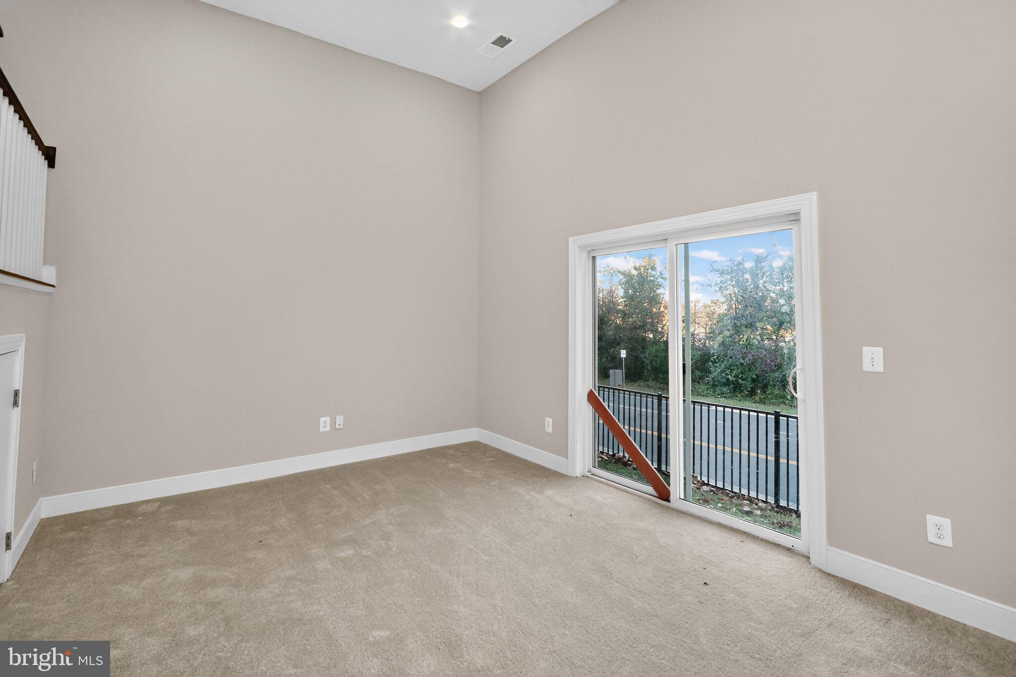1322 Rail Woodbridge, VA 22191 - Photo 29 of 30 a view of an empty room with wooden floor and a window