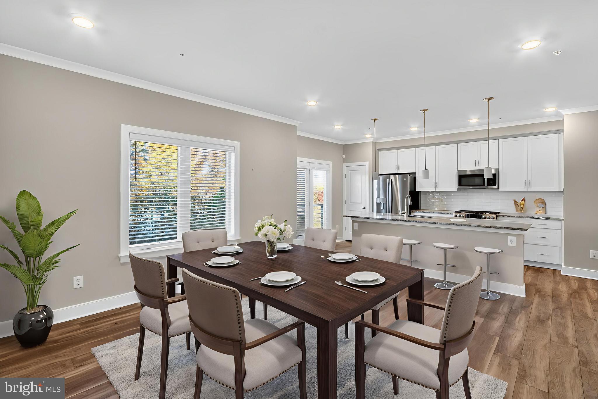 1322 Rail Woodbridge, VA 22191 - Photo 5 of 30 a view of a dining room with furniture and wooden floor