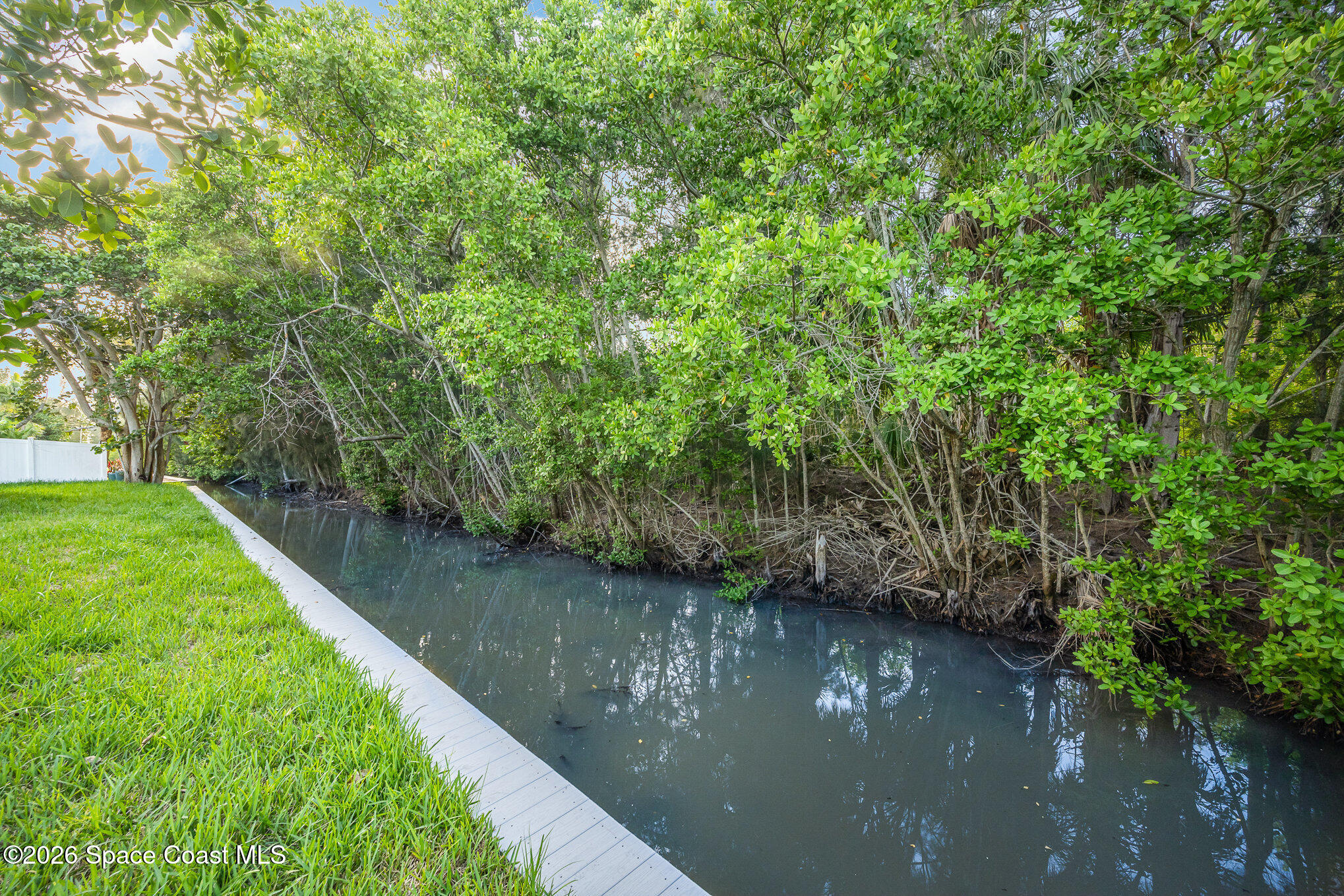 362 Nikomas Way Melbourne Beach, FL 32951 - Photo 28 of 32 a view of a lake from a yard