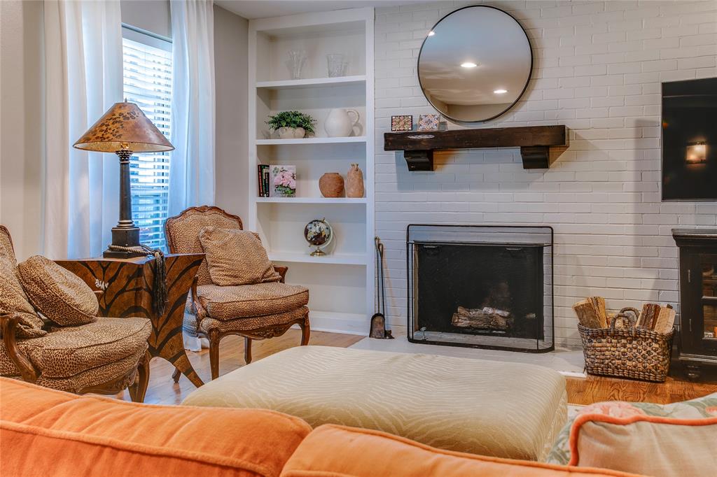7777 Royal Lane Dallas, TX 75230 - Photo 3 of 30 a living room with furniture and a fireplace
