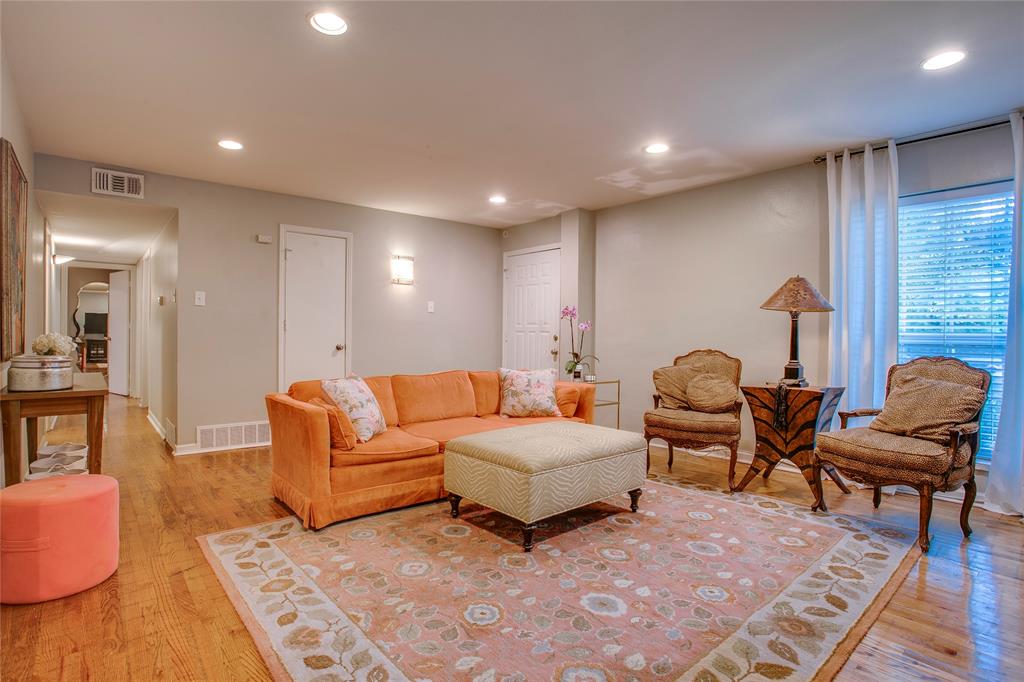 7777 Royal Lane Dallas, TX 75230 - Photo 4 of 30 a living room with furniture rug and wooden floor