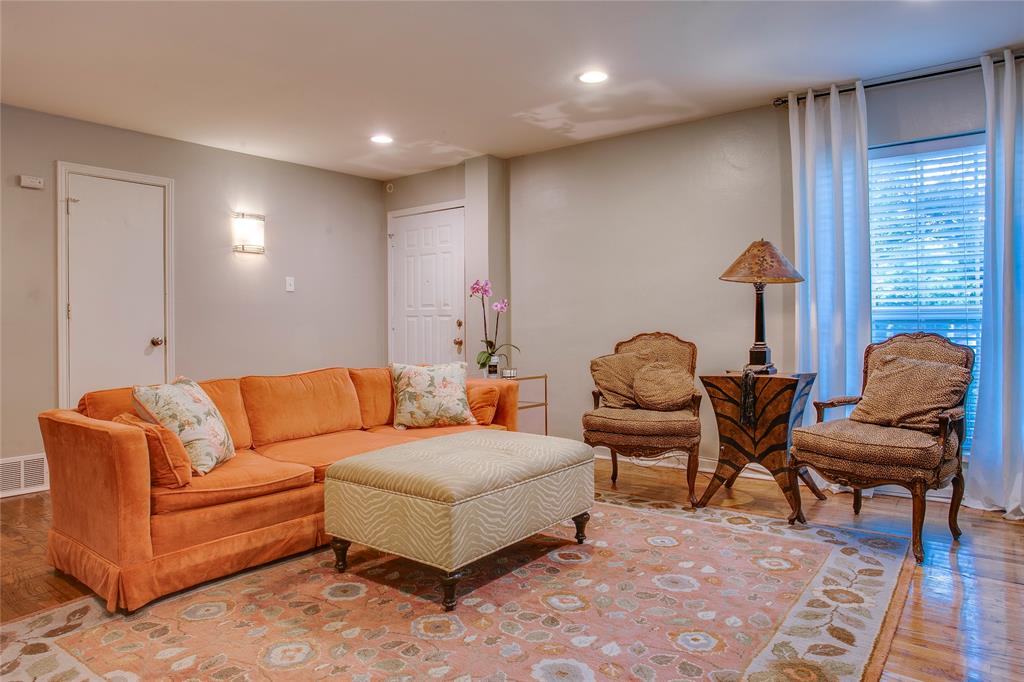 7777 Royal Lane Dallas, TX 75230 - Photo 5 of 30 a living room with furniture and a lamp