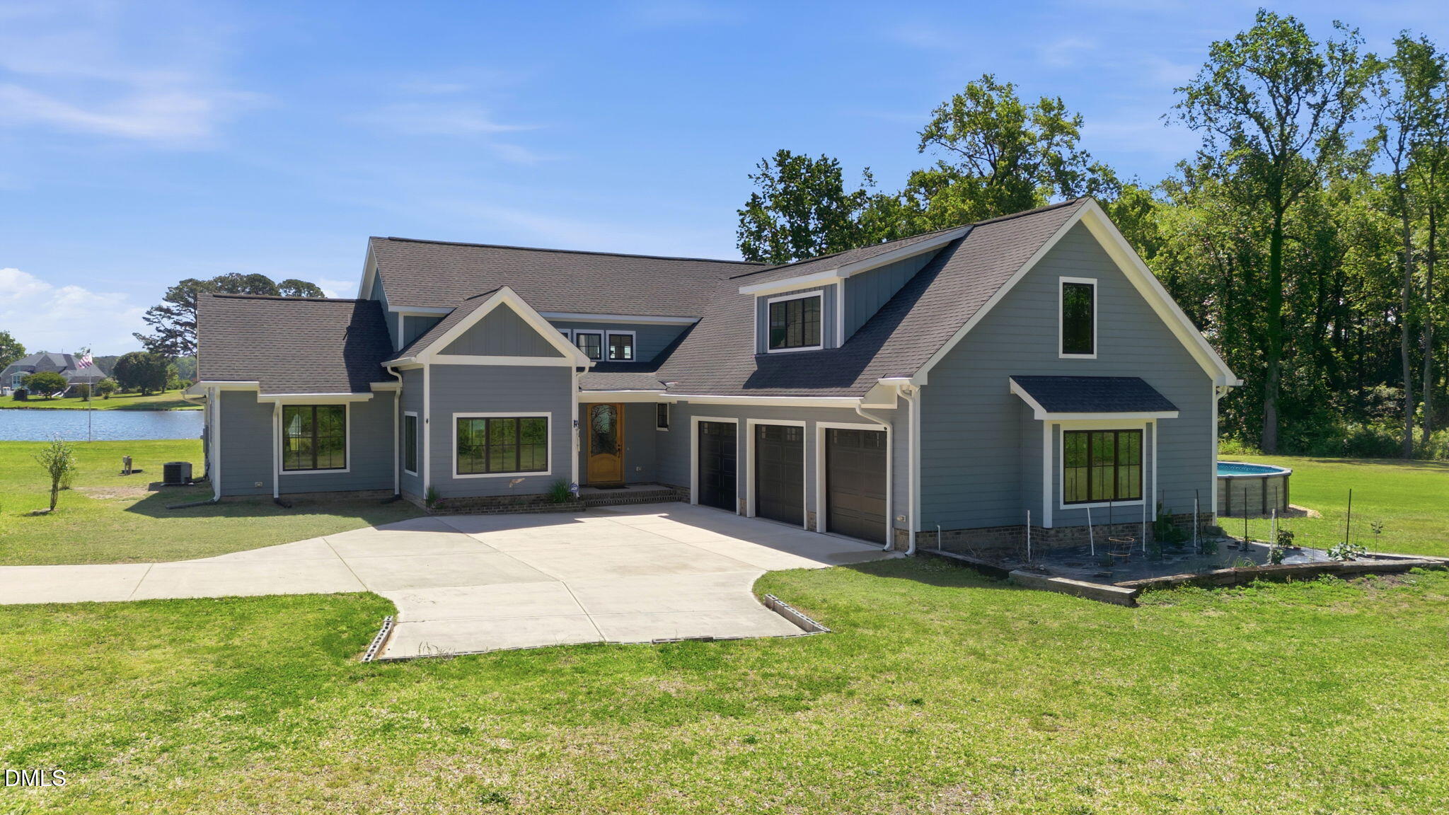 35 North Rippling Court Smithfield, NC 27577 - Photo 2 of 59 a front view of house with yard and green space