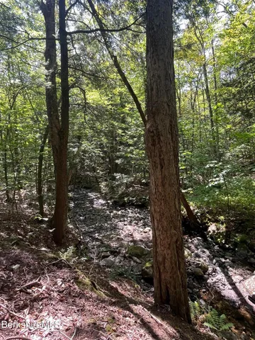 a picture of a room with wooden floor