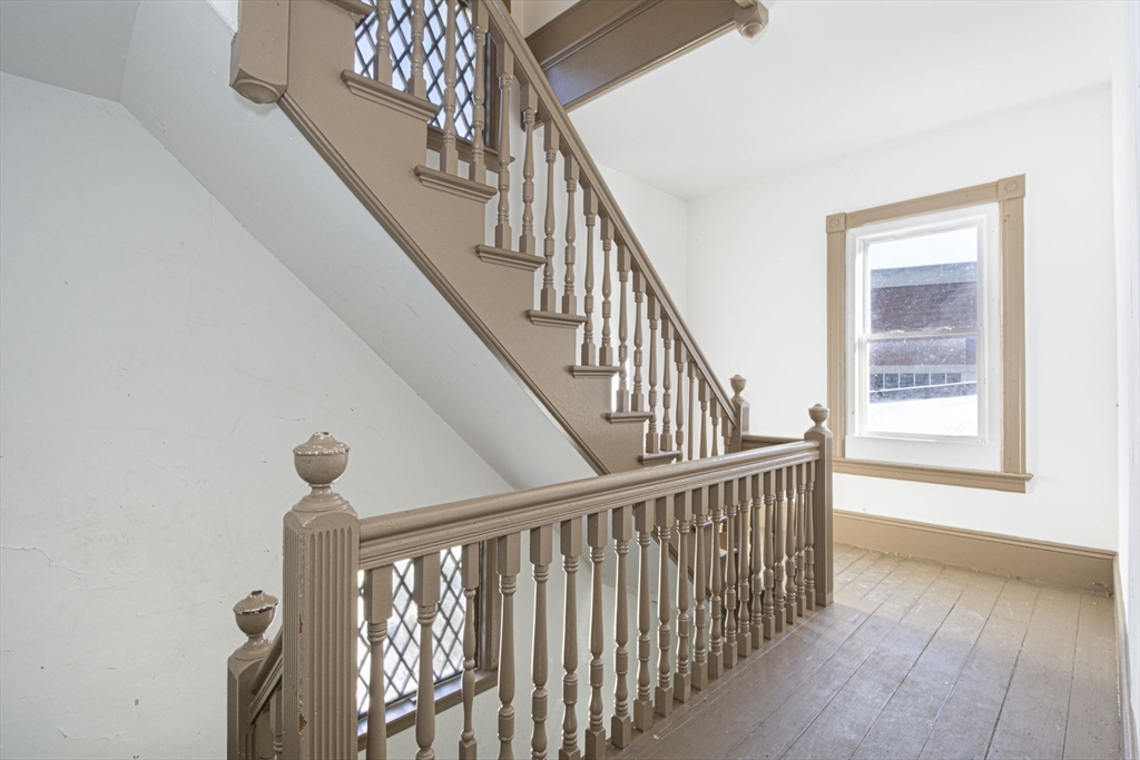 109 Merrifield Street Worcester, MA 01605 - Photo 6 of 21 a view of entryway with wooden floor