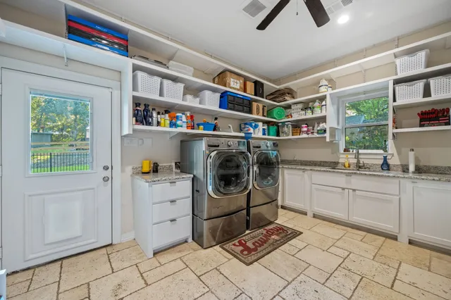 a storage room with washer and dryer