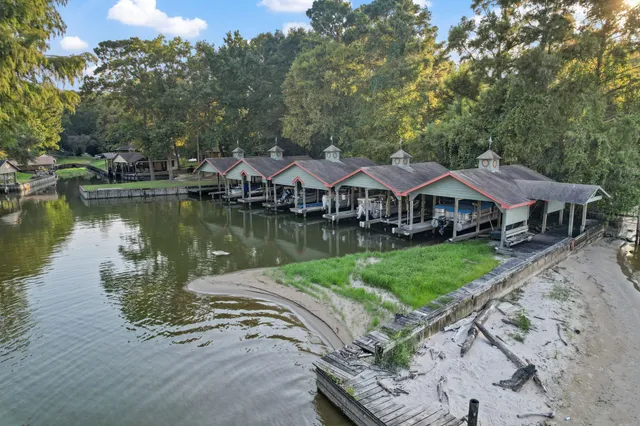 a front view of a house with a yard table and chairs