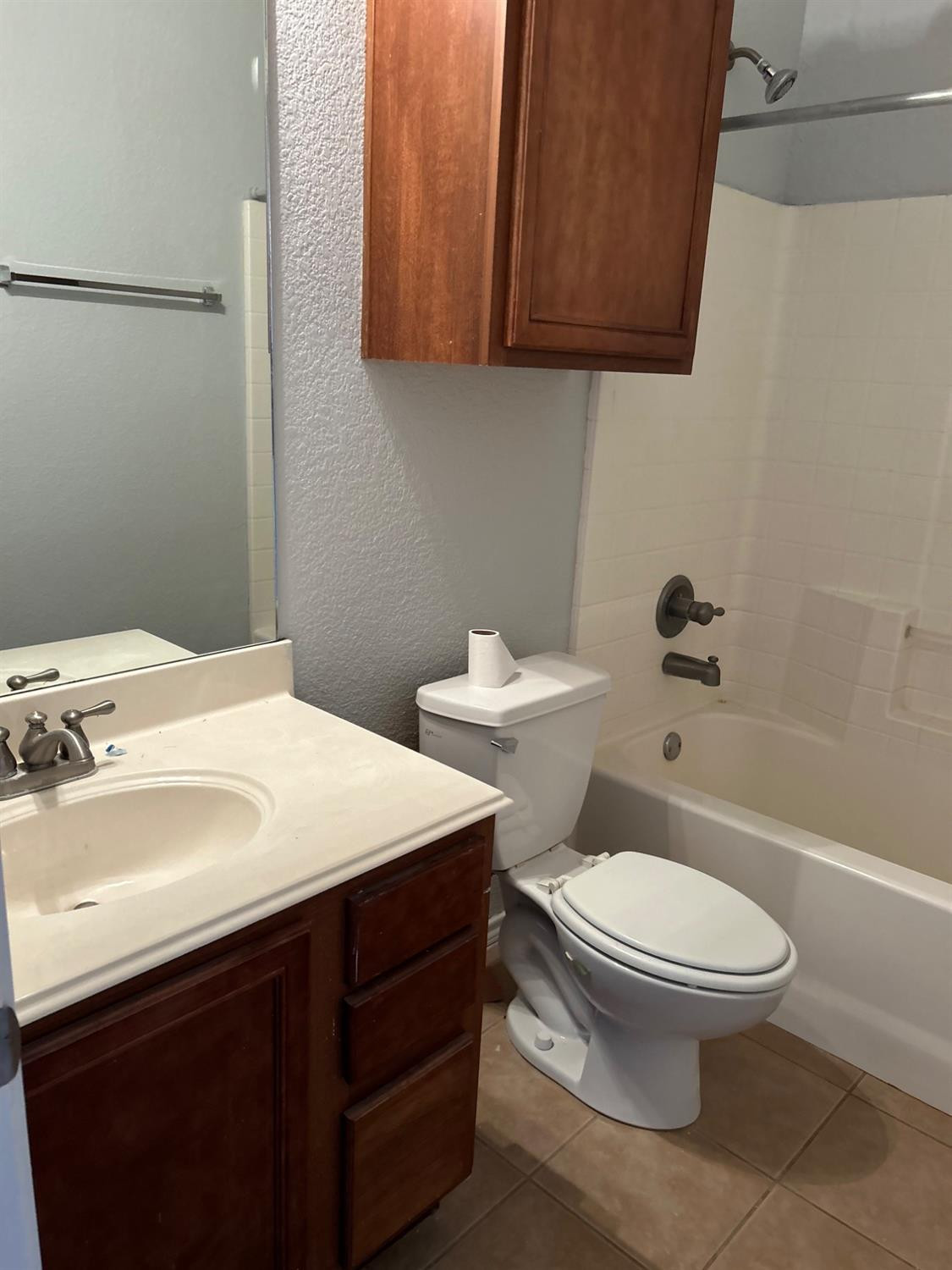 3601 Pontiac Avenue Lubbock, TX 79407 - Photo 12 of 14 a bathroom with a sink a toilet and shower