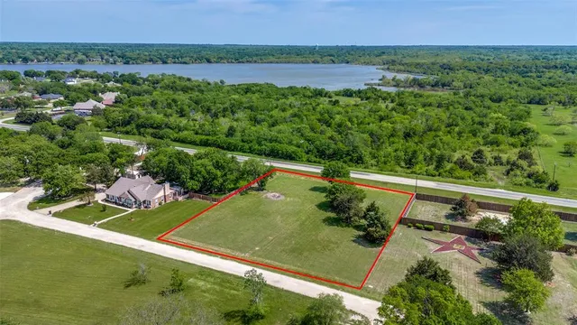 a view of a garden with a lake