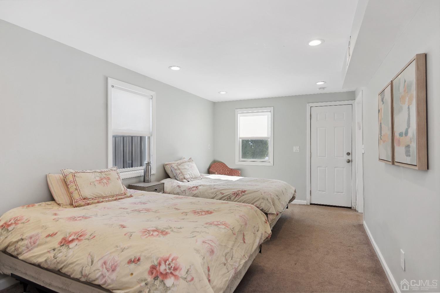 6 Barlow Road Edison, NJ 08817 - Photo 17 of 44 a bedroom with double bed and a window