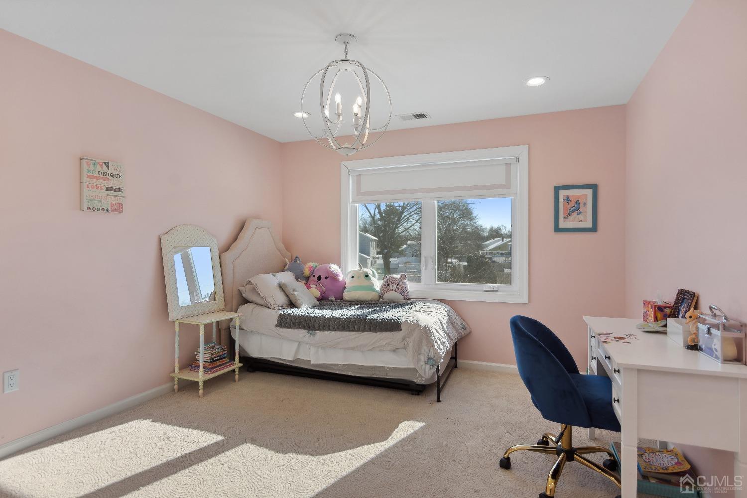 6 Barlow Road Edison, NJ 08817 - Photo 23 of 44 a living room with furniture and a window