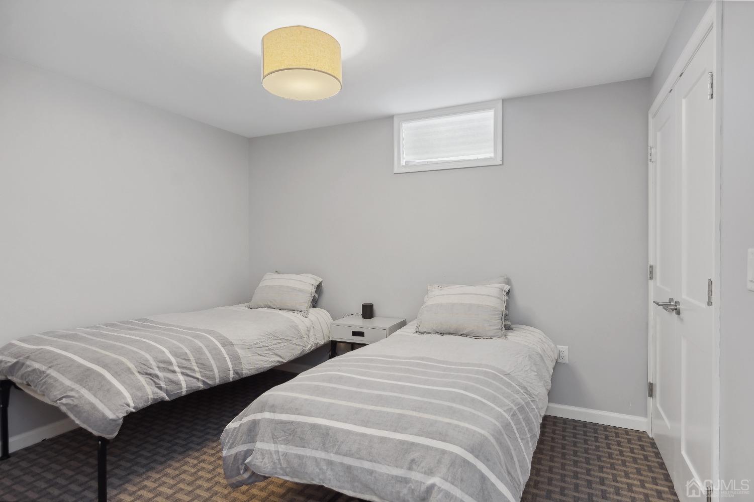 6 Barlow Road Edison, NJ 08817 - Photo 34 of 44 a bedroom with two beds and lamps