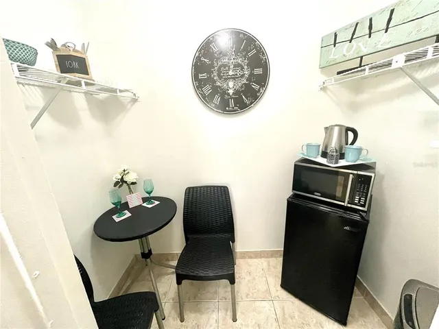 a table and chairs in a kitchen