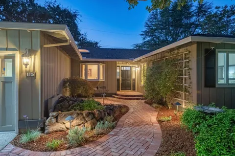 a house view with a backyard space