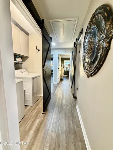 a view of a porch with furniture and a fireplace