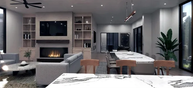 a living room with furniture a fireplace and a flat screen tv